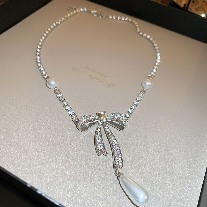 Elegant Pearl Bow Necklace