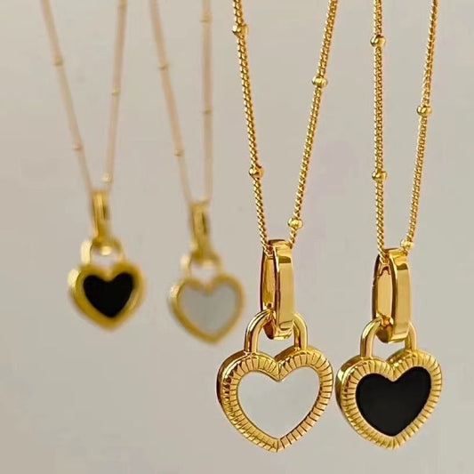 Black And White Heart Pendant Necklace In Gold