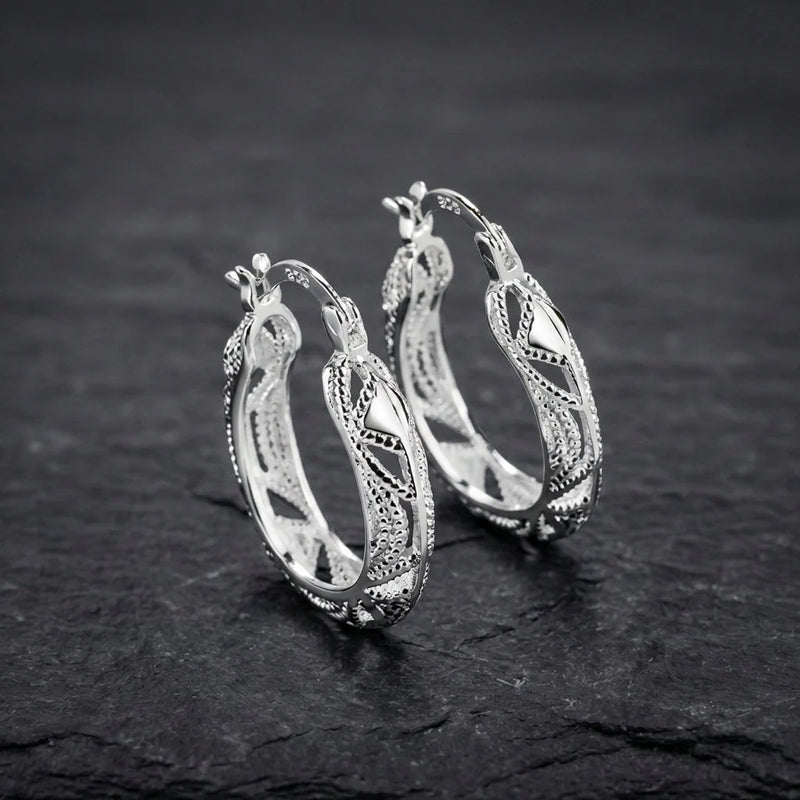 Elegant Carved Silver Earrings