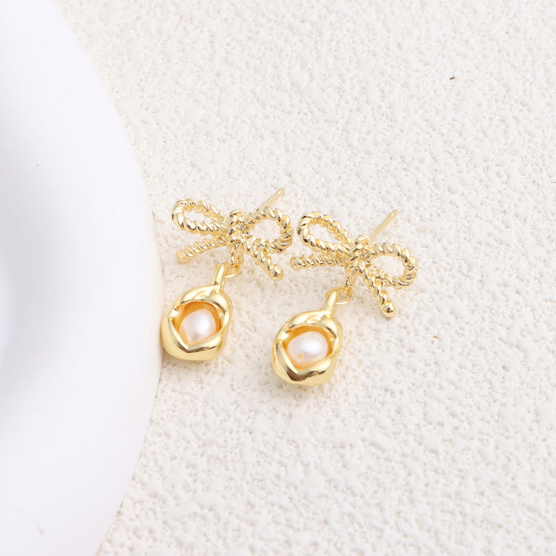 Elegant Pearl Bow Earrings