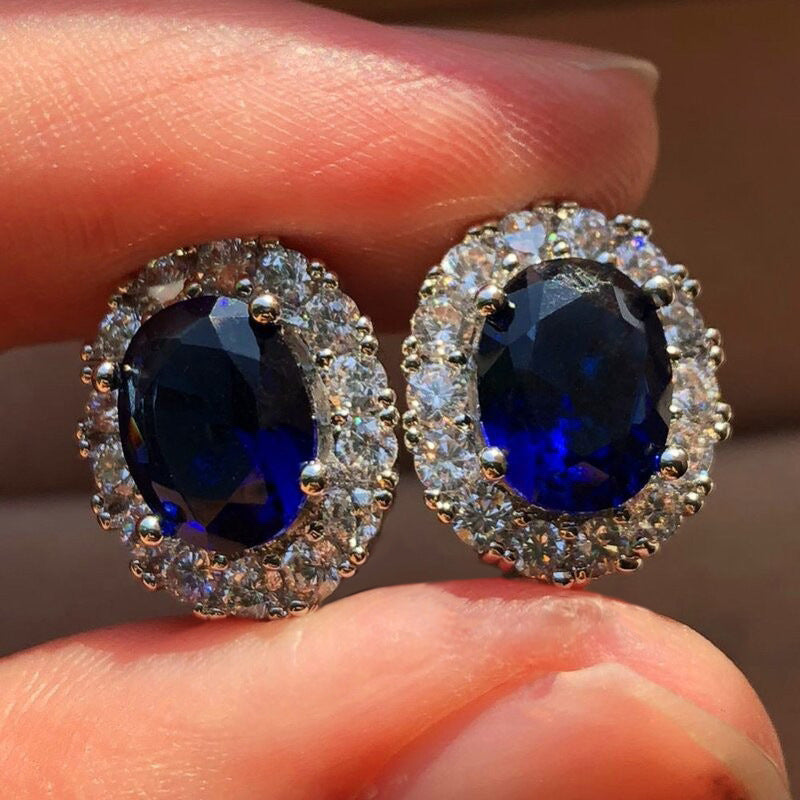 Elegant Oval White Sapphire Stud Earrings In 14k White Gold